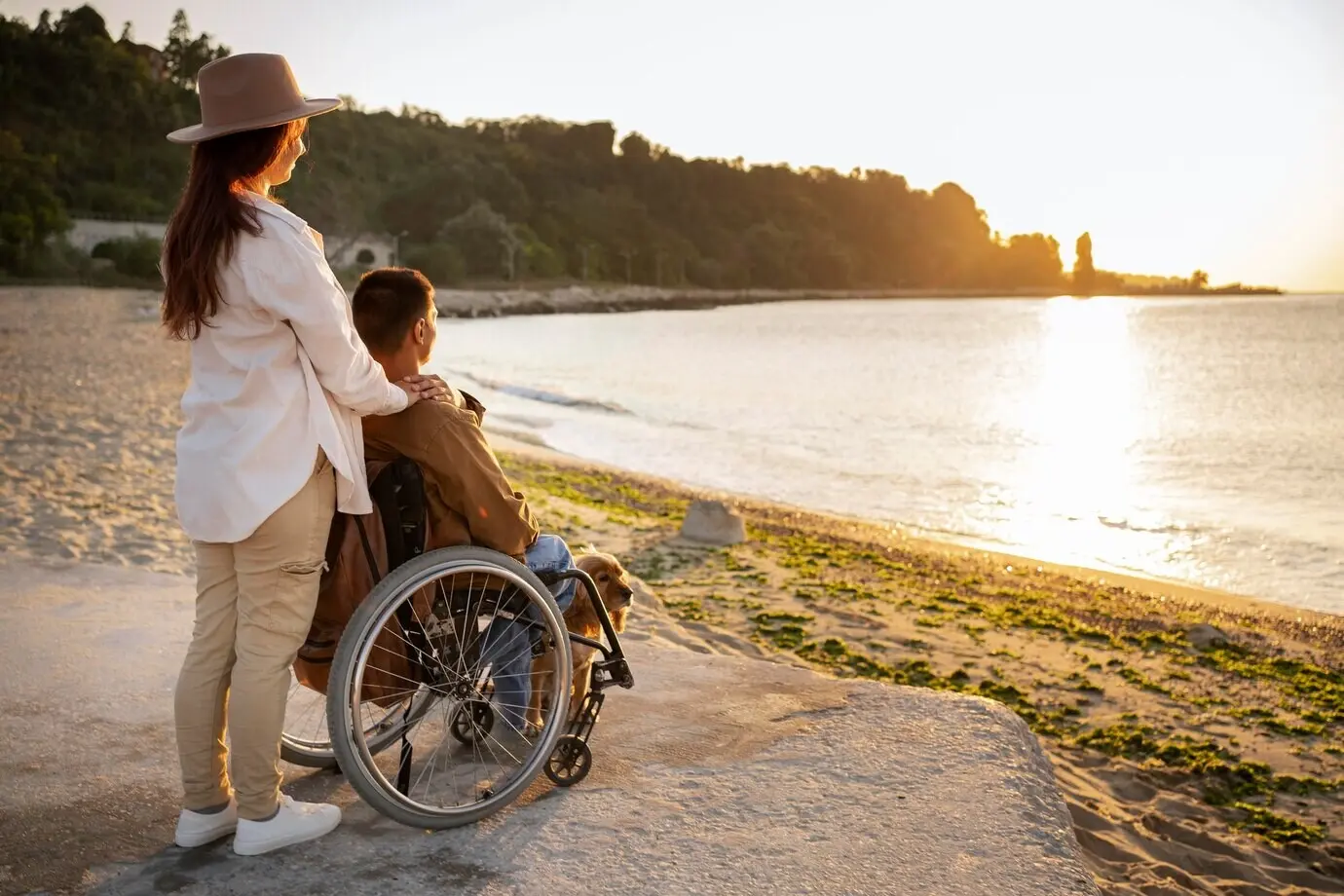 Full-length shot of a woman and a disabled man traveling.